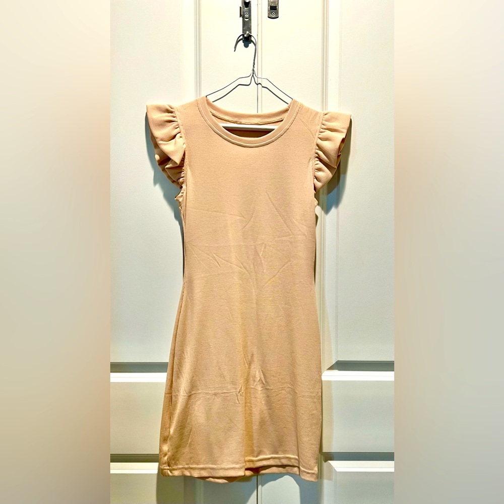 NWOT. Juniors/women’s cream dress. Knee length (I am 5’4”). Ruffle shoulders